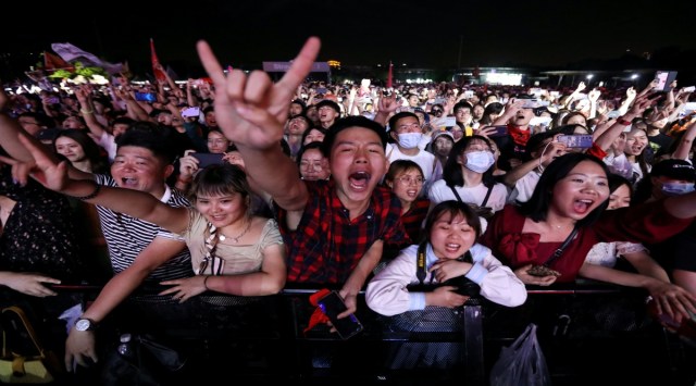 Fans attend a performance of a rock band at the Strawberry Music Festival during Labour Day holiday in Wuhan, Hubei Province, China May 1, 2021. (Reuters)