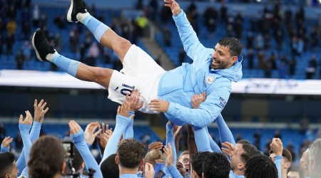 Manchester City's Sergio Aguero is thrown in the air by teammates as they celebrate winning the Premier League after his last match at the Etihad Stadium as a Manchester City player (Source: Reuters)