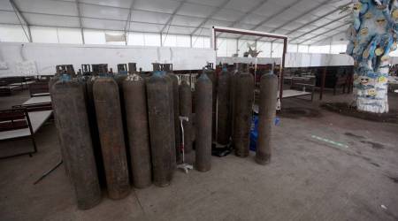 The Vadodara administration shifted 30 Covid19 patients from the Triage dome at GMERS-run Gotri hospital into the main building in view of the Taukte Cyclone on Monday. (Express photo by Bhupendra Rana)