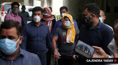 Sushil Kumar and his associate Ajay Sherawat after their arrest in Delhi. (Express Photo: Gajendra Yadav)