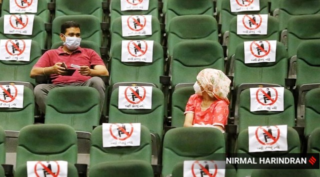 People waiting to get vaccinated for Covid-19 during a mega vaccination drive held at Tagore Hall in Ahmedabad. (Express Photo by Nirmal Harindran)