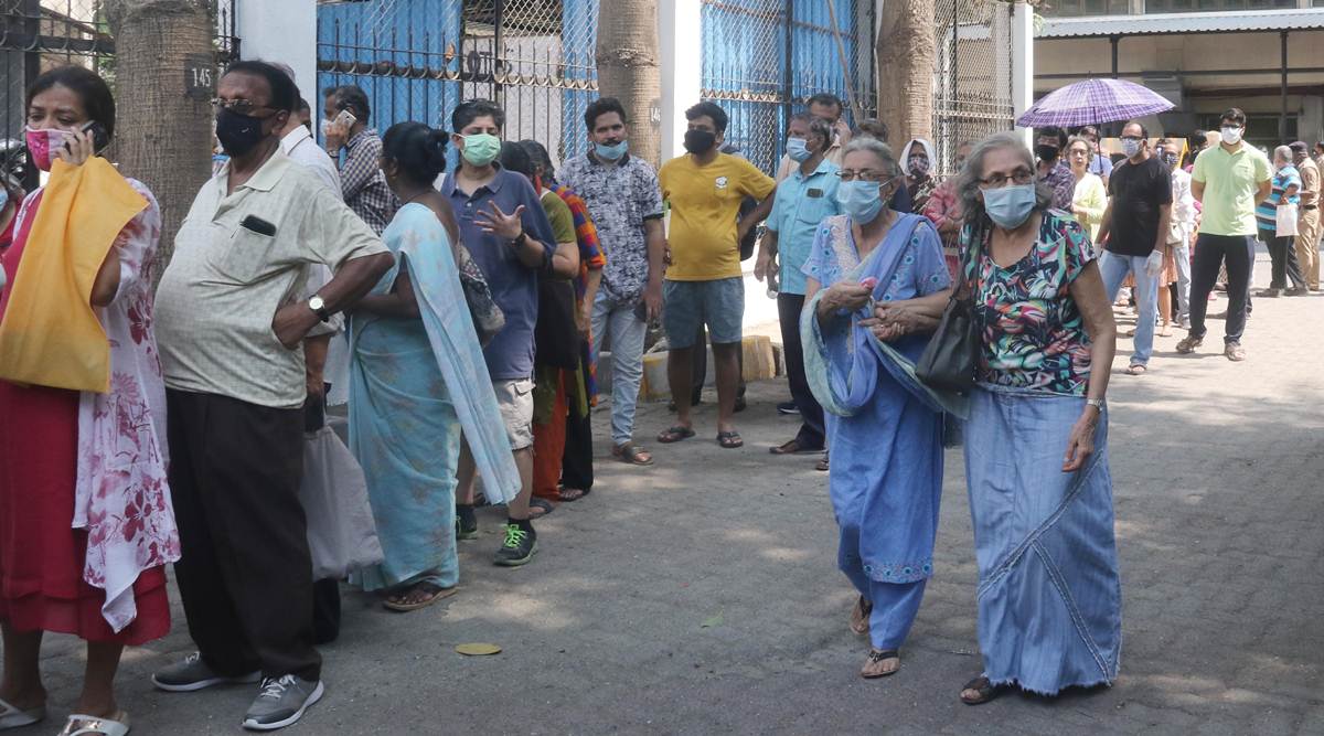 At a vaccination centre in Mumbai on Wednesday. The Union Health Ministry said the cumulative number of Covid vaccine doses administered in the country has crossed 16 crore. (Express photo by Ganesh Shirsekar)