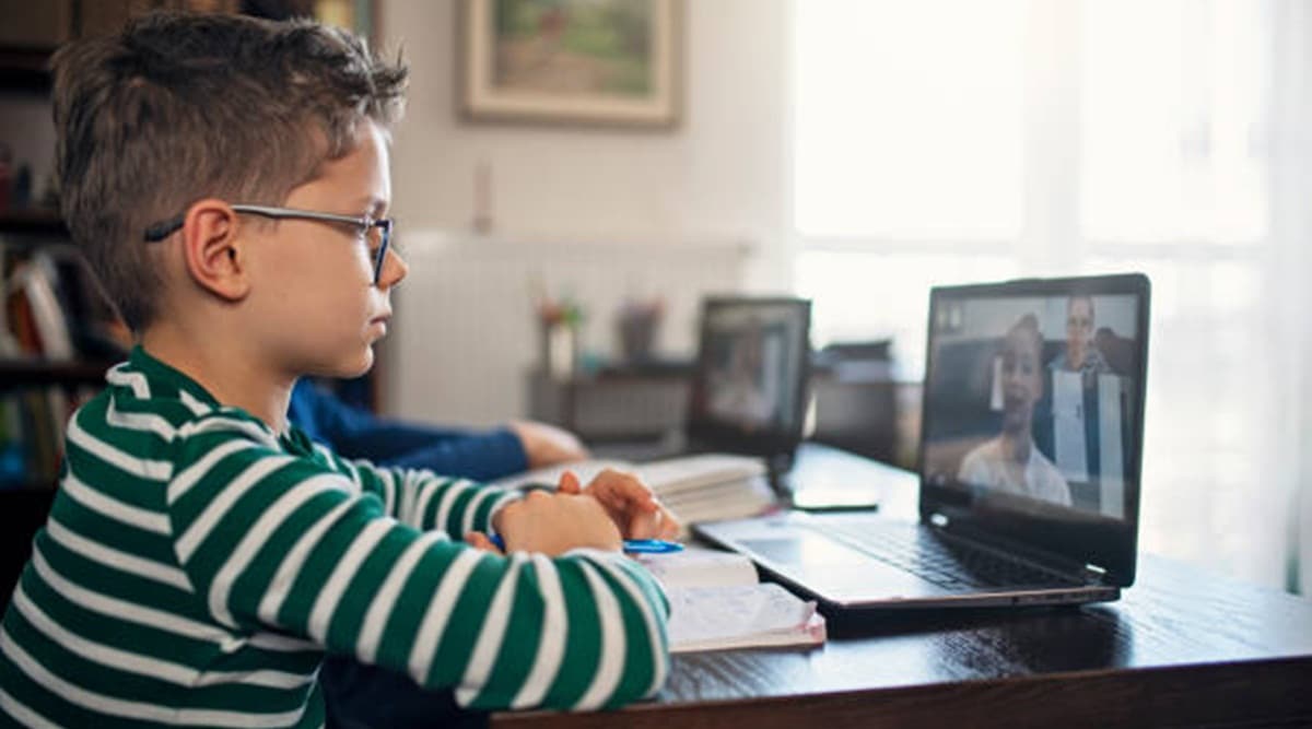 children are attending school remotely in