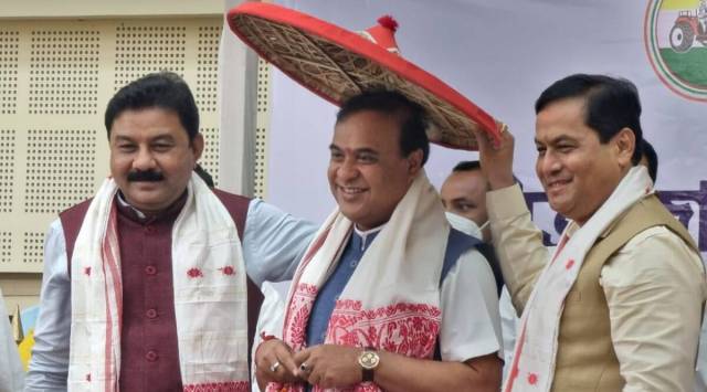 Himanta Biswa Sarma, who is all set to take oath at 12 pm on Monday as the 15th chief minister of Assam, with BJP state president Rajeet Dass (left) and outgoing CM Sarbananda Sonowal on Sunday. (Photo: Assam CM)
