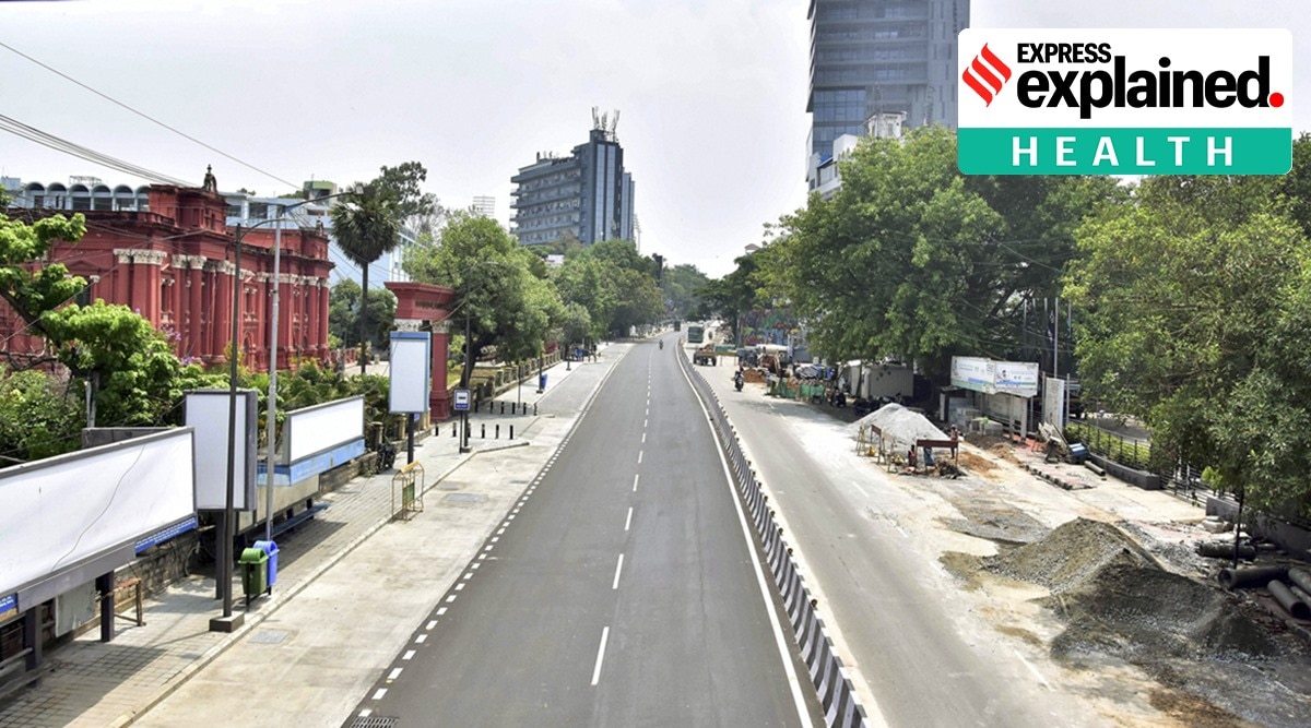 Bengaluru: Kasturba road wears a deserted look during the weekend curfew amid surge in coronavirus cases, in Bengaluru, Saturday, April 24, 2021. (PTI Photo)