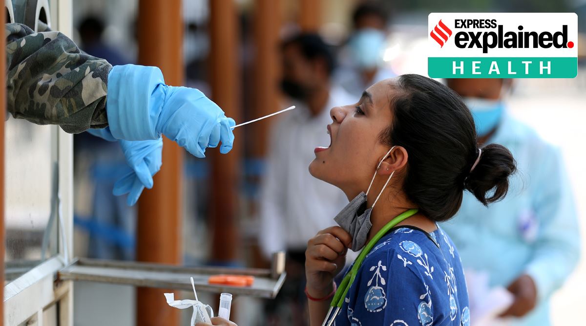 A woman tests for Covid-19 in Lucknow. (Express Photo: Vishal Srivastav)
