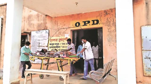 Gurcharan Hembrom was wheeled to an ambulance. 