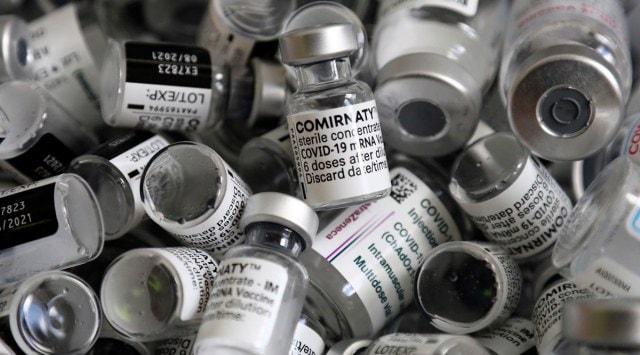 Vials of the Pfizer-BioNTech COVID-19 vaccine lie in a box during a vaccine campaign at the Vaccine Village in Ebersberg near Munich, Germany. (AP Photo/Matthias Schrader, File)
