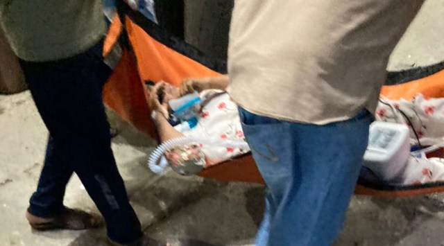 Family of Talimunissa shift her from Sunrise Hospital into an ambulance 