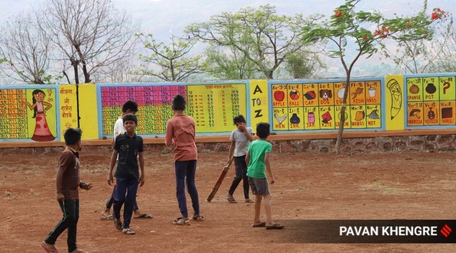 Several walls in the village have been painted with images of the solar system, water cycle, mathematics tables, English and Marathi alphabets, list of states and their capitals, the family tree of Maratha king Shivaji and much more. (Express Photo by Pavan Khengre)