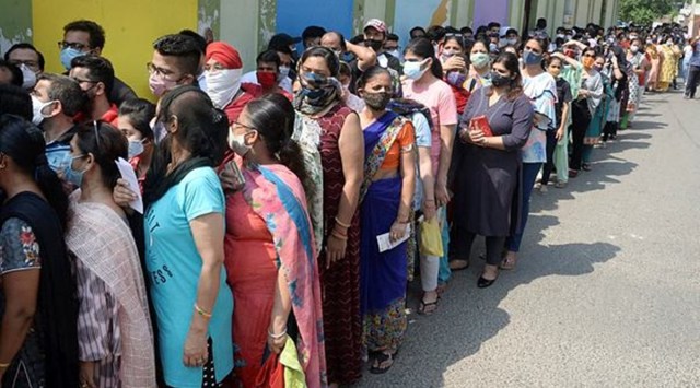 Beneficiaries wait in a queue to receive COVID-19 vaccine dose at a vaccination centre in Jalandhar, Saturday, May 22, 2021. (PTI Photo)