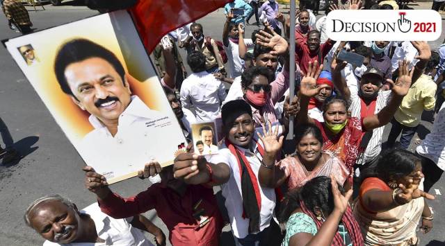 DMK workers celebrate in Chennai on Sunday. (PTI)