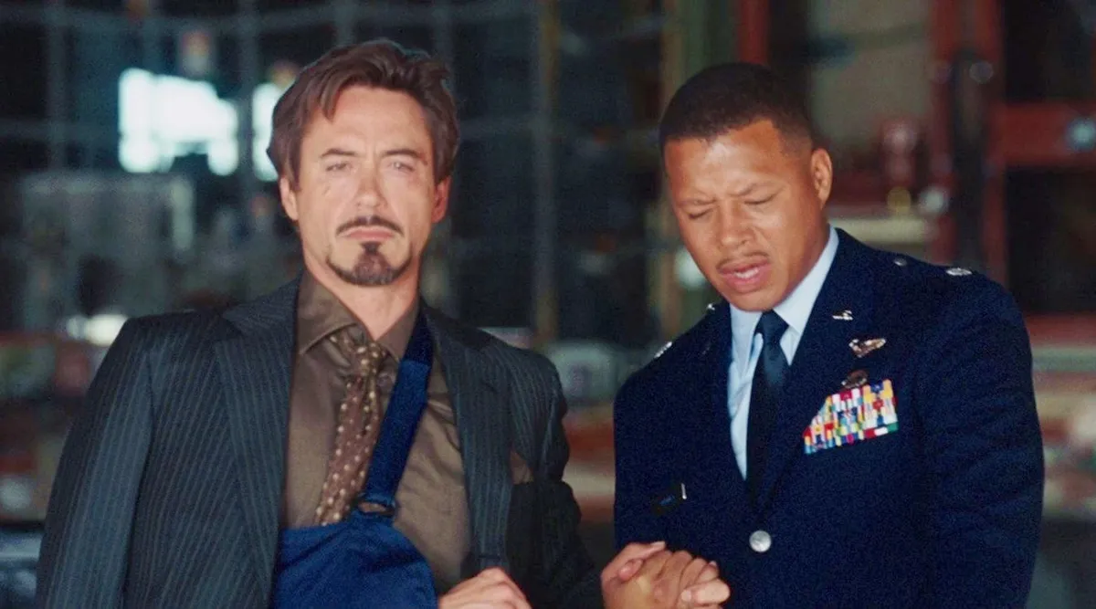 Robert Downey, Jr. as Tony Stark/Iron Man (right) and Terrance Howard (left) in "Iron Man" (2008)