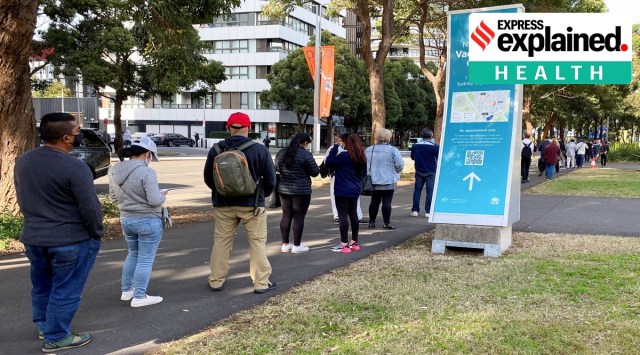 People wait in line outside a coronavirus disease vaccination centre at Sydney Olympic Park in Sydney, Australia, June 23, 2021.  (Reuters Photo: Loren Elliott)