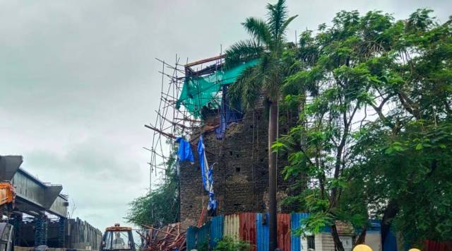 While heavy rain lashed the city, the wall of Belapur fort collapsed in Navi Mumbai on Saturday afternoon.
(Express Photo)