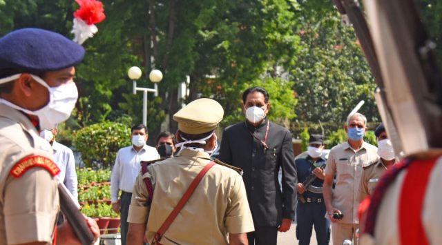Dharam Pal being welcomed with a guard of honour in Chandigarh on Wednesday.  (Express Photo by Jasbir Malhi)