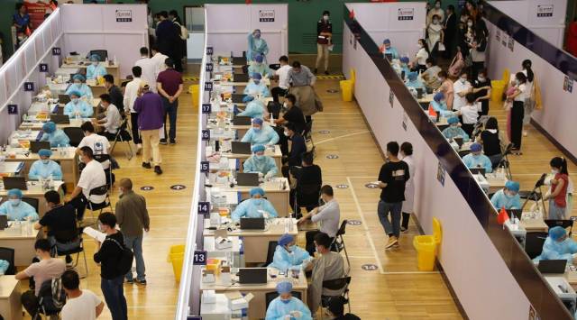 Chin avaccination, China Covid vaccines, China news, China-20 million Covid shots a day, China covid cases and deaths, world news, Indian express