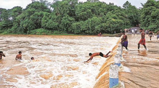 Overflowing Dulung river in Chilkigarh, Thursday. (PTI)