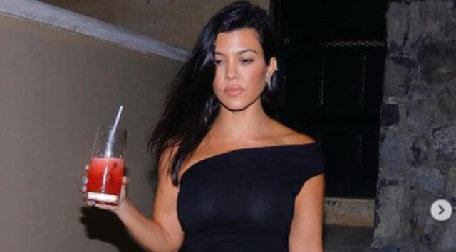 Kourtney Kardashian, Kourtney Kardashian news, Kourtney Kardashian diamond fangs, Kourtney Kardashian veneers, Kourtney Kardashian and Travis Barker, indian express news