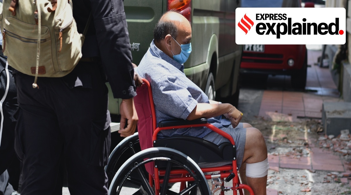 Antigua and Barbuda businessman Mehul Choksi is taken in a wheelchair to the magistrate's court by police after his arrest for illegal entry into the country, in Roseau, Dominica, Friday, June 4, 2021. (AP)