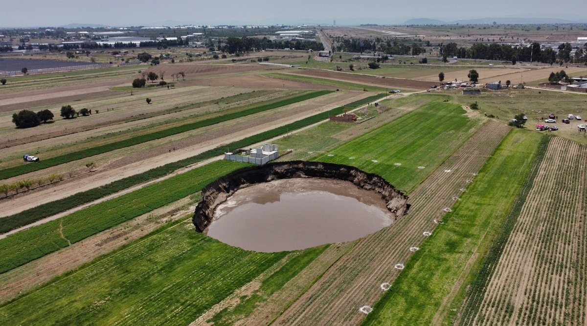 Sinkhole at Mexico farm swallows more land, eats at house World News