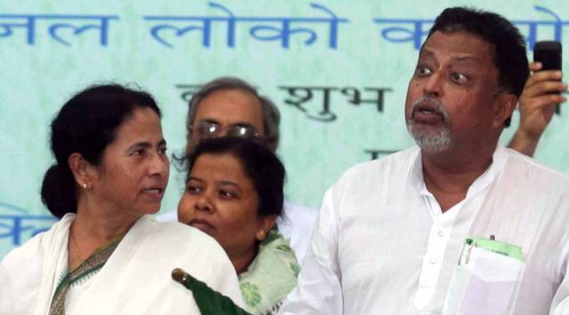 Mukul Roy with Bengal CM Mamata Banerjee in 2012. (Express Archive)