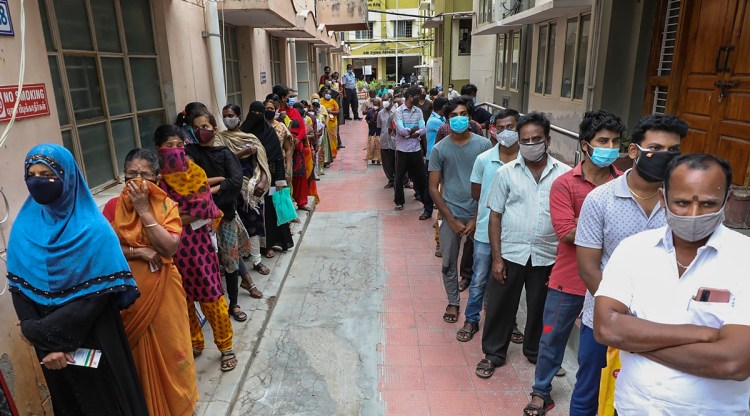 Beneficiaries wait to receive a dose of Covid-19 vaccine at a government hospital in Krishnagiri, Monday, June 14, 2021. (PTI Photo)