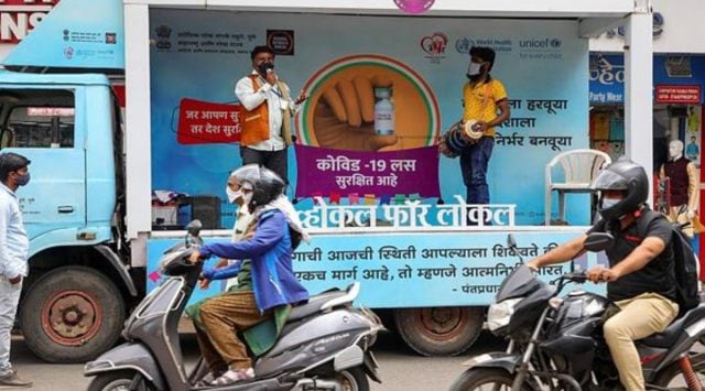 Artists performing on street on Kunthekar road during an initiative to create more awareness about Covid Vaccine and procedures of getting vaccinated on Friday, Initiative organised by Regional outreach bureau along with PMC. (Express photo by Ashish Kale)
