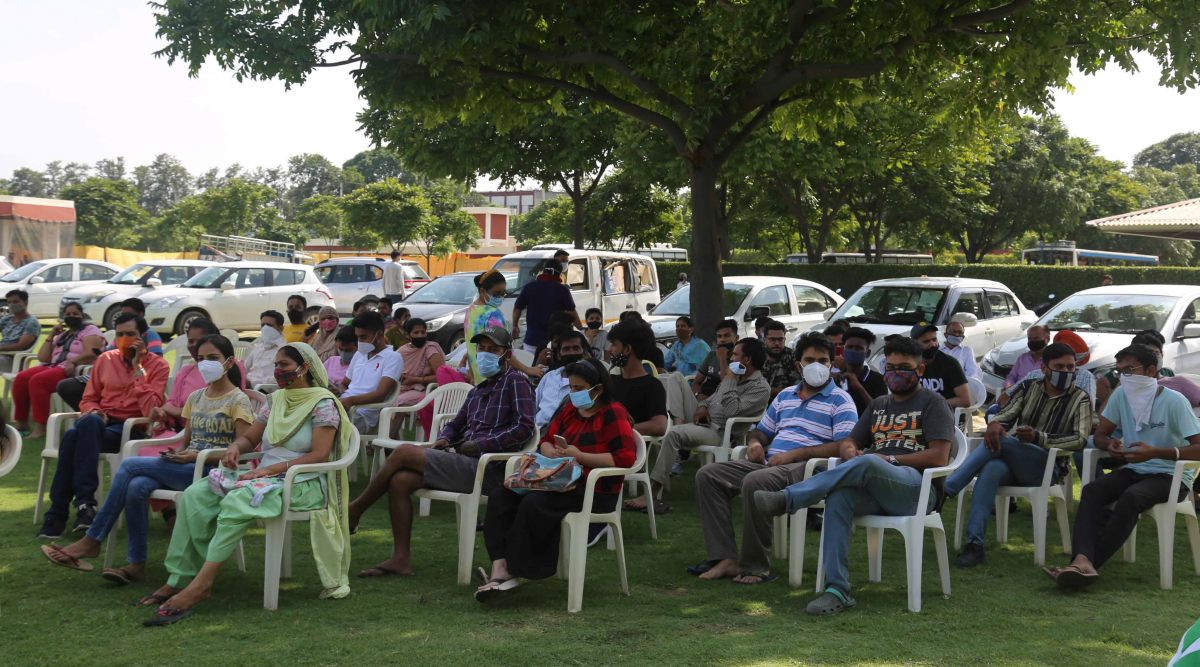 Beneficiaries  waits their turn during the Vaccination camp at Radha Swami Satsang Bhawan in Ludhiana.(Express Photo by Gurmeet Singh)