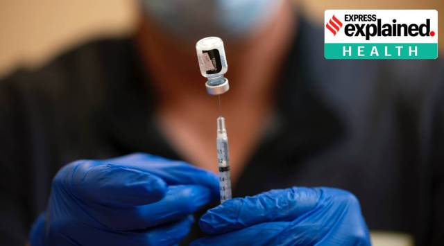 A pharmacist prepares a dose of the Pfizer COVID-19 vaccine at a clinic in Nashville on May 13, 2021. Scientists are asking a lot of questions about Covid-19 booster shots, but they don’t yet have many answers.  (Brett Carlsen/The New York Times)