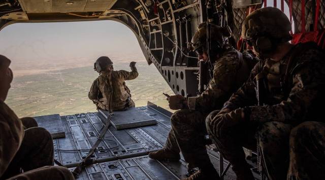 American military personnel fly over Helmand province in Afghanistan, Sept. 26, 2019. (The New York Times: Jim Huylebroek)