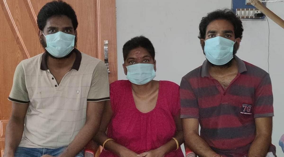 Rakesh (left) and Rajnish with Rinku at their home in Ramchua, Banka.