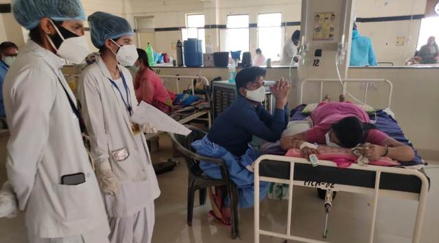 Nursing students Saroj Choudhary and Pooja Saini are PBM Hospital’s designated ‘Oxygen Mitras’. (Express photo by Shivnarayan Rajpurohit)