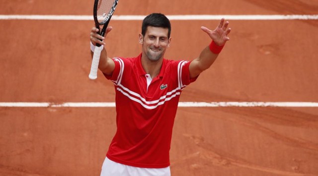 Novak Djokovic celebrates his win after his French Open third round match. (Reuters)