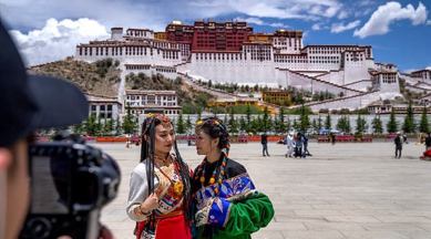Tibet tourism boom, tourism boom in Tibet, AP tourism boom in Tibet, Associated Press, tourism pressures historic sites, historic sites in Tibet, fragile environment in Tibet, indianexpress.com