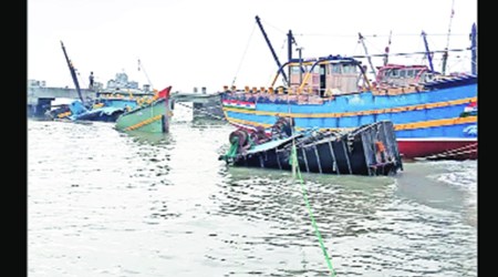 Boats damaged by cyclone Tauktae in Diu. (Express Photo by Bipin Bamania)