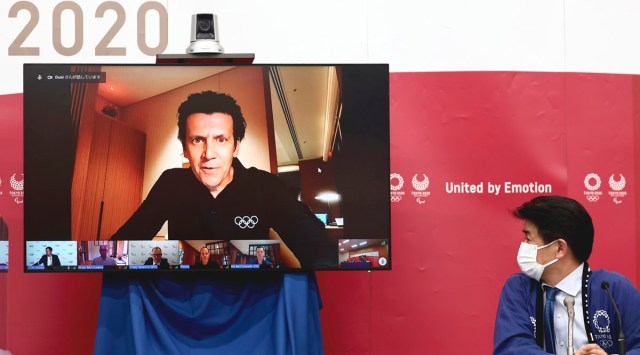 Olympic Games Executive Director of IOC Christophe Dubi speaks as chief of the main operation centre of Tokyo 2020 Hidemasa Nakamura, right, looks on during a press briefing for the presentation of the version three of Tokyo 2020 Playbook in Tokyo, Tuesday, June 15, 2021. (Behrouz Mehri/Pool Photo via AP)