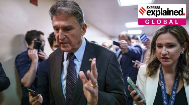 Sen. Joe Manchin, D-W.Va., a crucial 50th vote for Democrats on President Joe Biden's proposals, walks with reporters as senators go to the chamber for votes ahead of the approaching Memorial Day recess, at the Capitol in Washington, Thursday, May 27, 2021.  (AP Photo/J. Scott Applewhite)