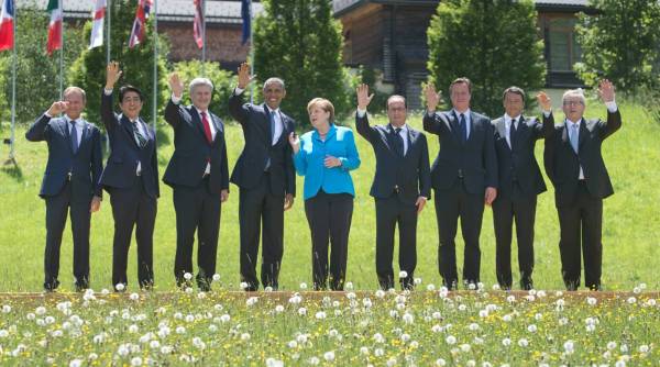 Angela Merkel, anchor of European stability, stays focused at her final G-7