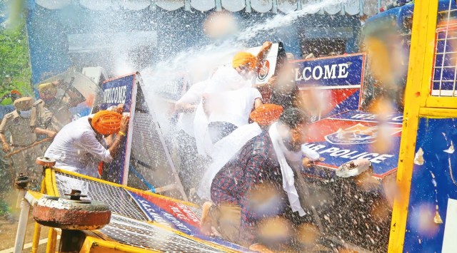 Police unleashed water cannons when protesters tried break past the second layer of barricades.