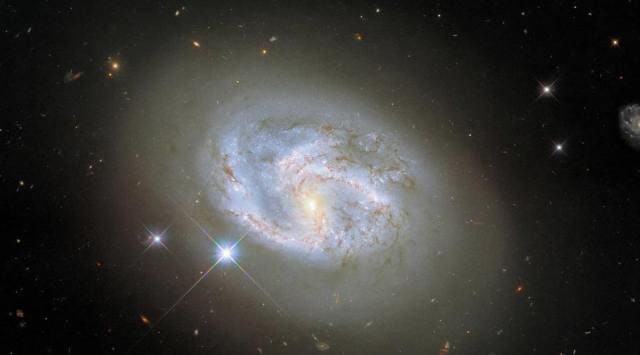 NASA captures a stunning image of the spiral galaxy NGC 4680 ...