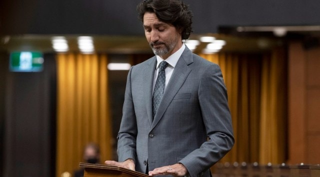 Canadian Prime Minister Justin Trudeau speaks during a debate about the discovery of remains of 215 children at the site of the Kamloops Indian Residential School, in the House of Commons, in Ottawa, Ontario, Tuesday, June 1, 2021. (Adrian Wyld/The Canadian Press via AP)