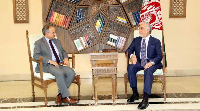 Abdullah Abdullah with Indian ambassador to Afghanistan Rudrendra Tandon.