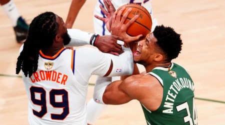 Milwaukee Bucks forward Giannis Antetokounmpo (34) battles Phoenix Suns forward Jae Crowder (99) during game three of the 2021 NBA Finals at Fiserv Forum. Mandatory Credit: Mark J. Rebilas-USA TODAY Sports