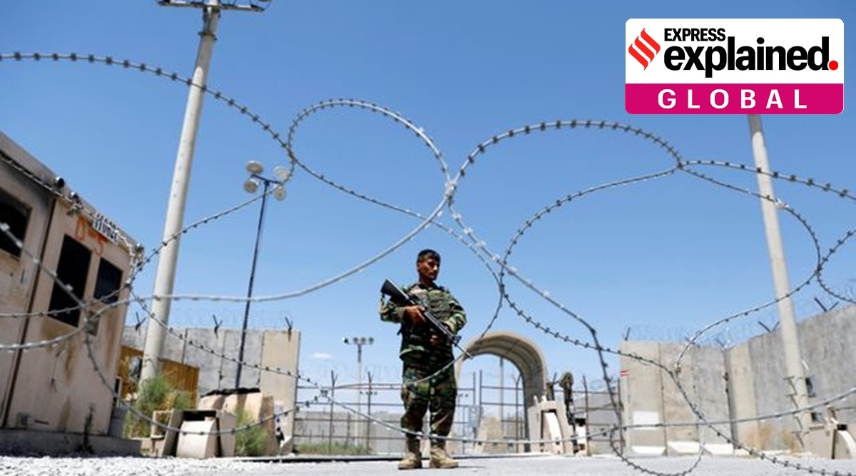 An Afghan National Army soldier stands guard at the gate of Bagram U.S. air base, on the day the last of American troops vacated it, Parwan province, Afghanistan. (Reuters Photo: Mohammad Ismail, File)