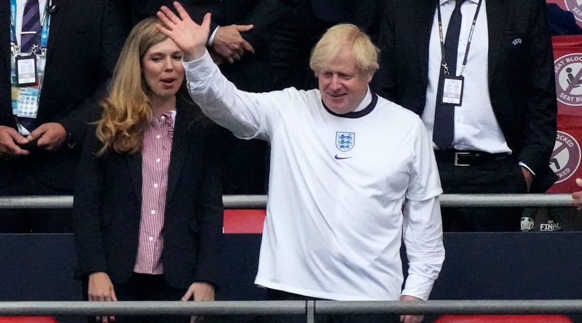 British Prime Minister Boris Johnson and his wife Carrie watch the Euro Cup final at the Wembley Stadium in London on Sunday. (Photo: AP)