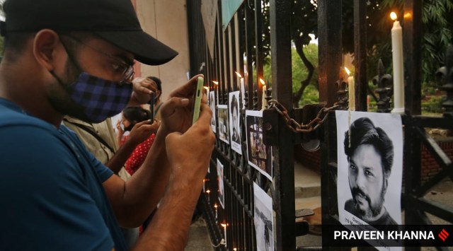 Candle light vigil in the memory of Photojournalist Danish Siddiqui at Jamia in New Delhi on Saturday. (Express Photo by Praveen Khanna)