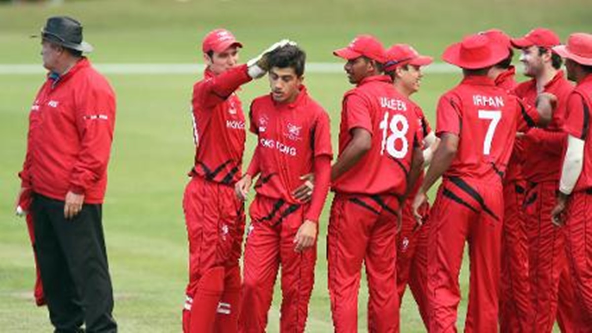 Aizaz Khan is congratulated by Hong Kong teammates (File Photo/ICC)
