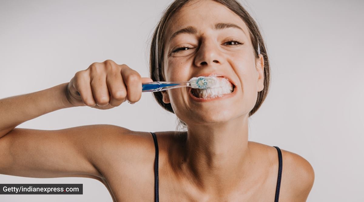 people brushing their teeth