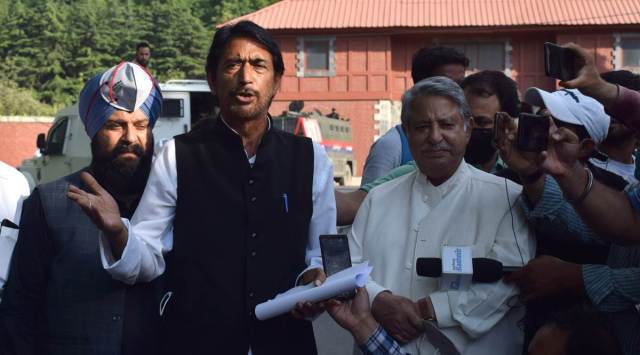 Cong leader Ghulam Ahmad Mir, other leaders talk to media after meeting the delimitation panel Tuesday. (Express photo by Shuaib Masoodi)